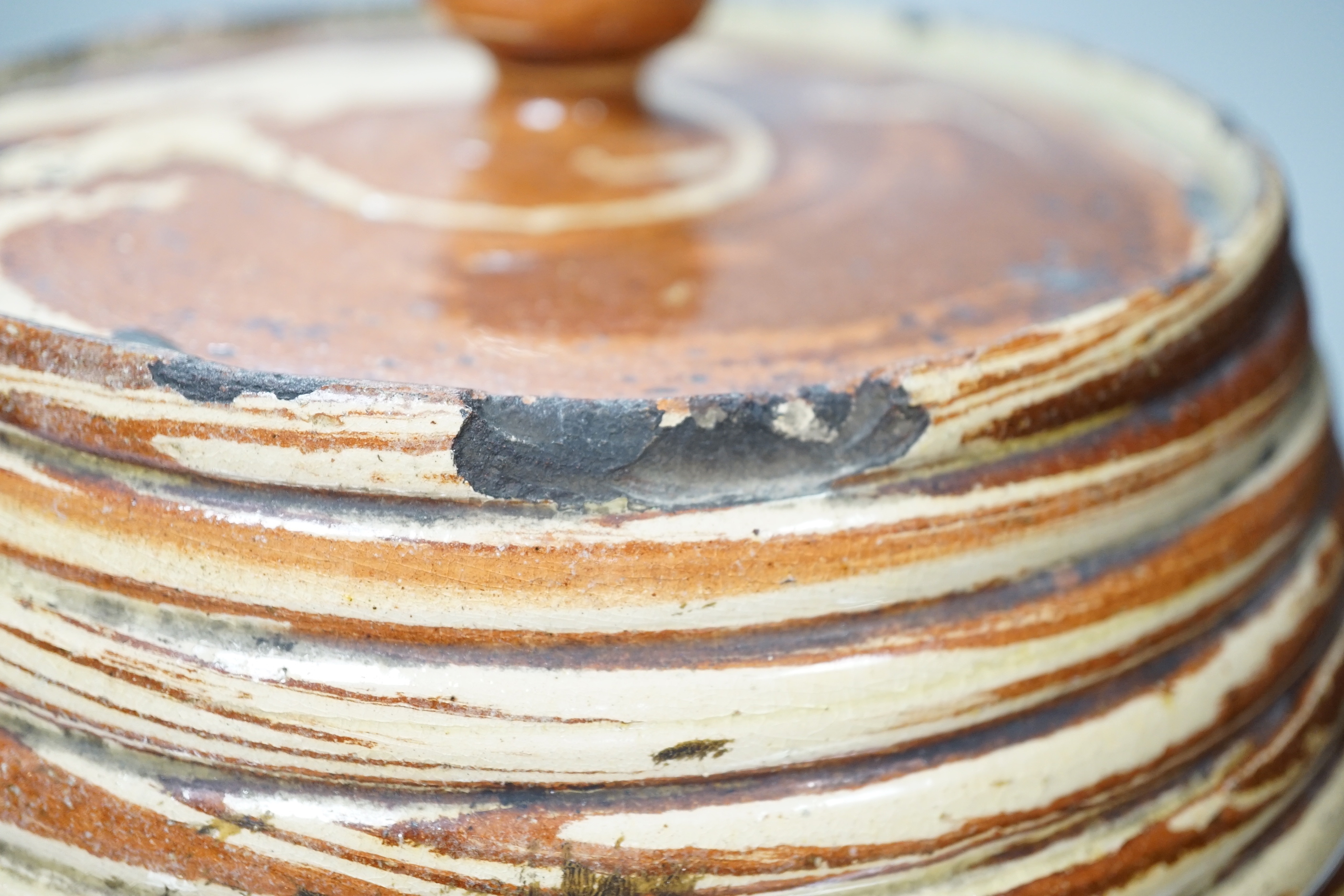 A Victorian Scottish Seaton pottery agate earthenware barrel shaped storage jar and cover, inscribed Mrs Robertson 1892 and another mottle glazed inscribed ‘Mrs Scogie 1894’, 25cm